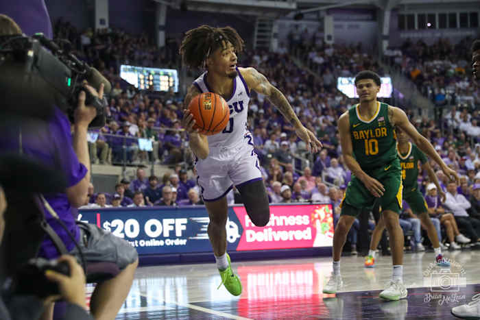 Micah Peavy keeping ball inbounds against Baylor on February 26, 2024.